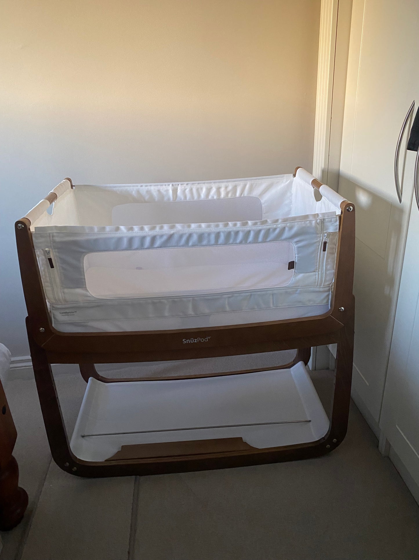 SnuzPod 4 beside crib