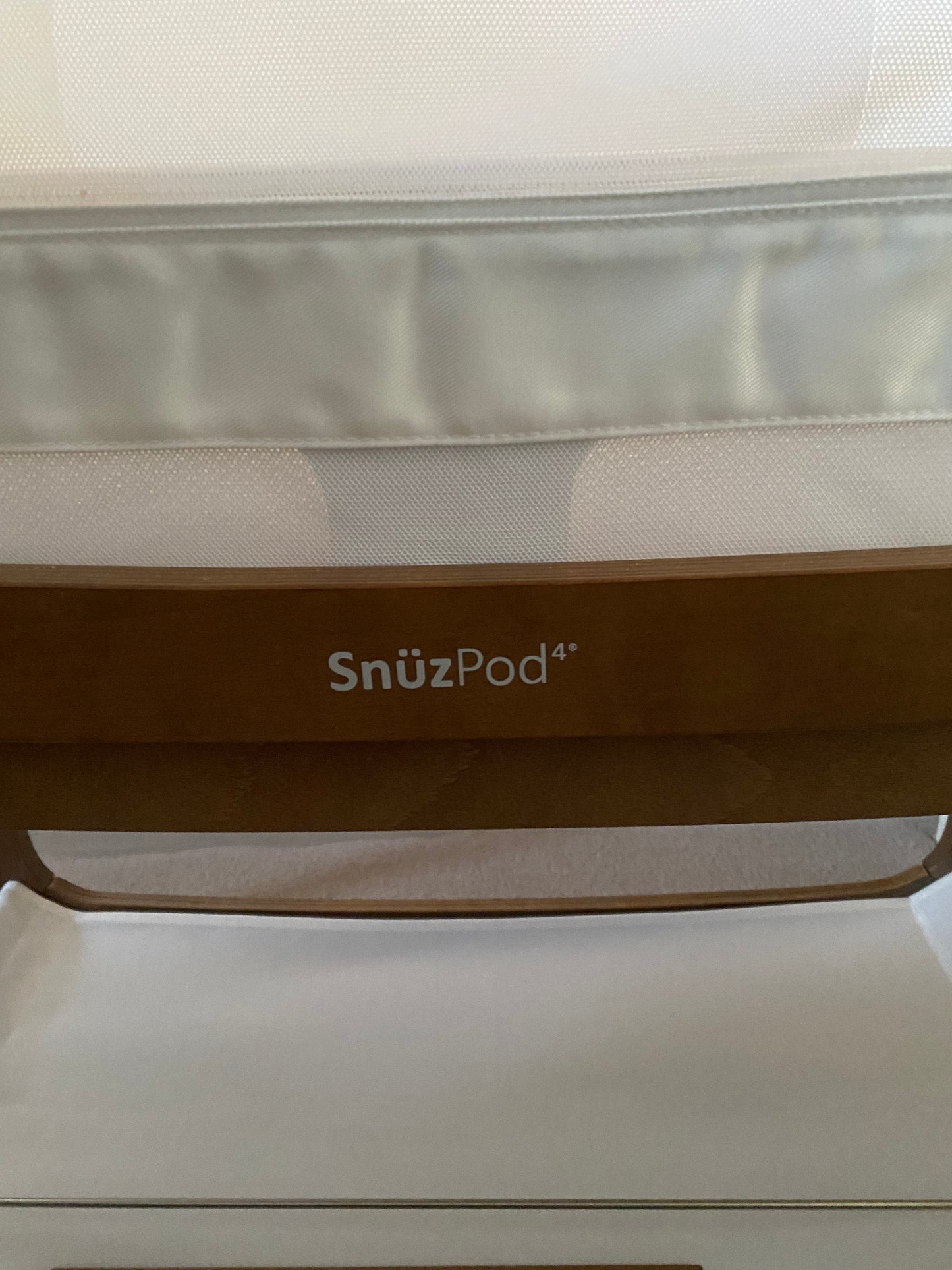 SnuzPod 4 beside crib