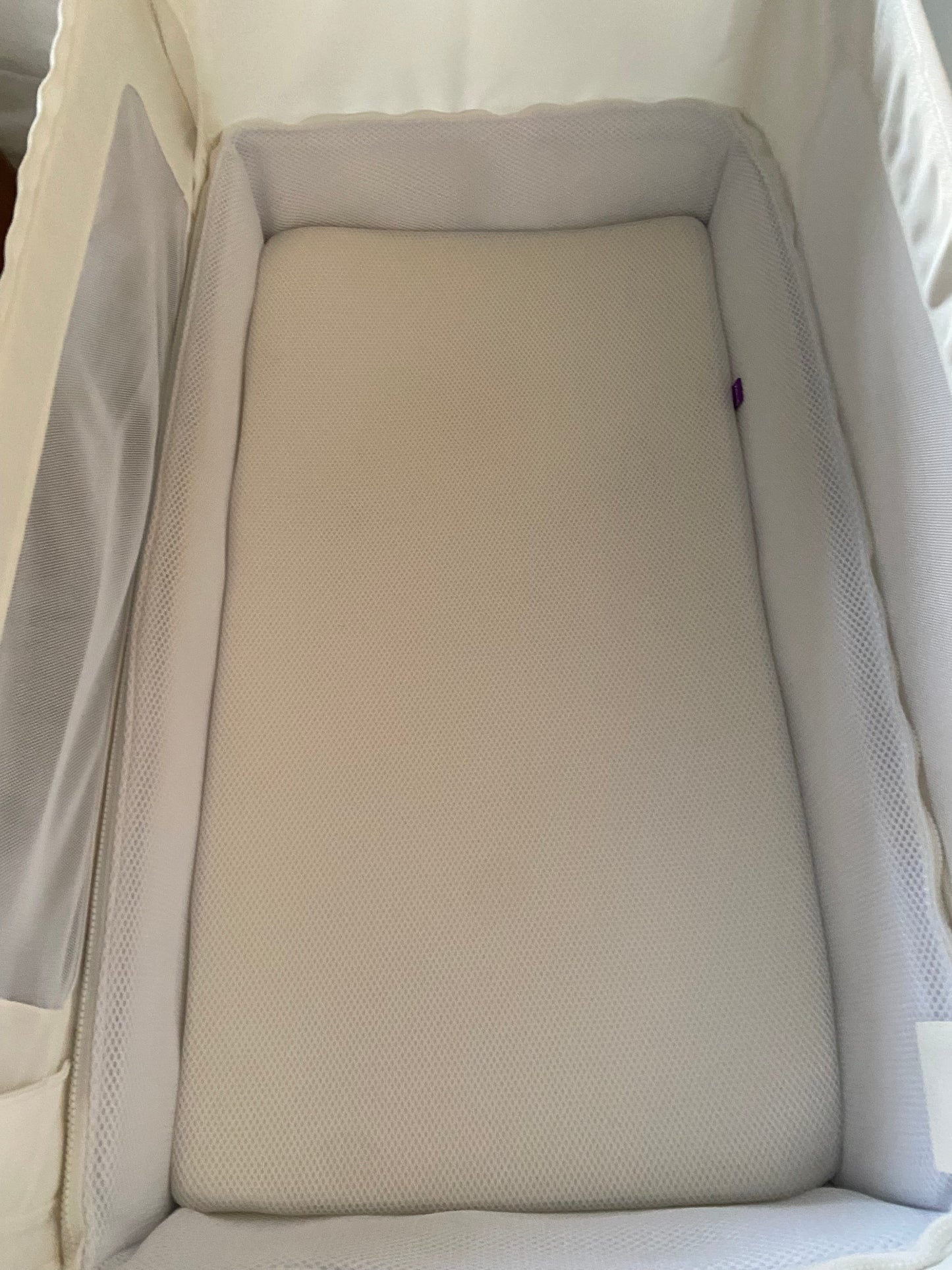 SnuzPod 4 beside crib